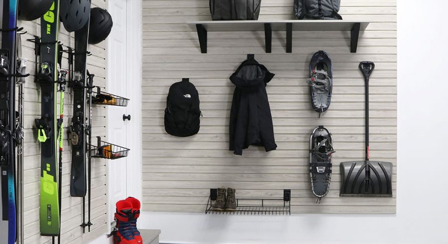 Organized garage with MKE Slatwall panels, hooks, and accessories for winter storage