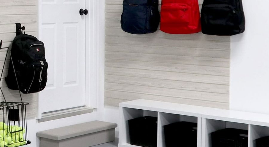 Transform your garage entrance into a functional mudroom with MKE Slatwall's versatile storage solutions.